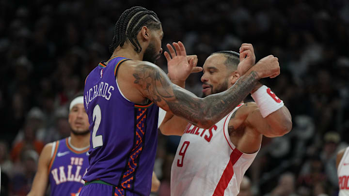 Phoenix Suns center Nick Richards (2) and Houston Rockets forward Dillon Brooks (9) shove each other.