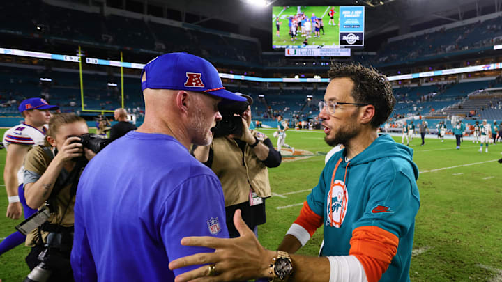 The Bills are interviewing McDaniel (right) for their head coaching job after firing McDermott (left). 