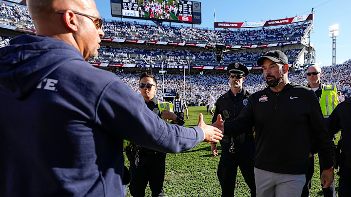 Ohio State Buckeyes head coach Ryan Day shakes hands with Penn State Nittany Lions head coach James Franklin following the 20-13 win in NCAA football game at Beaver Stadium in University Park, Pa. on Saturday, Nov. 2, 2024.