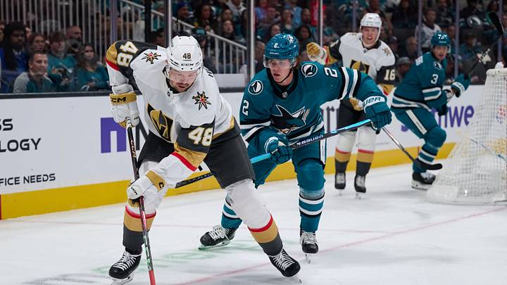 Oct 9, 2025; San Jose, California, USA; Vegas Golden Knights center Tomas Hertl (48) plays the puck and right wing Pavel Dorofeyev (16) looks on against San Jose Sharks center Will Smith (2) defenseman John Klingberg (3) during the first period at SAP Center at San Jose. Mandatory Credit: Robert Edwards-Imagn Images Oct 9, 2025; San Jose, California, USA; Vegas Golden Knights center Tomas Hertl (48) plays the puck and right wing Pavel Dorofeyev (16) looks on against San Jose Sharks center Will Smith (2) defenseman John Klingberg (3) during the first period at SAP Center at San Jose. Mandatory Credit: Robert Edwards-Imagn Images