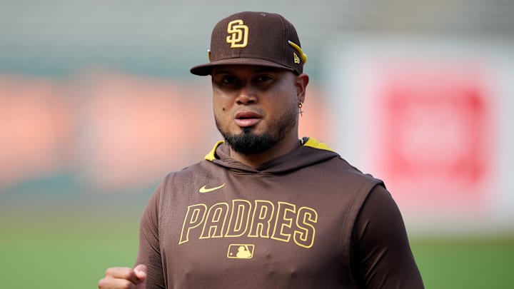 Aug 12, 2025; San Francisco, California, USA; San Diego Padres first baseman Luis Arraez (4) warms up before the game between the San Diego Padres and the San Francisco Giants at Oracle Park. Mandatory Credit: Robert Edwards-Imagn Images
