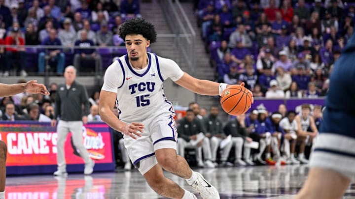 Jan 10, 2026; Fort Worth, Texas, USA; TCU Horned Frogs forward David Punch (15) brings the ball up court during the game between the Horned Frogs and the Wildcats at Ed and Rae Schollmaier Arena. Mandatory Credit: Jerome Miron-Imagn Images