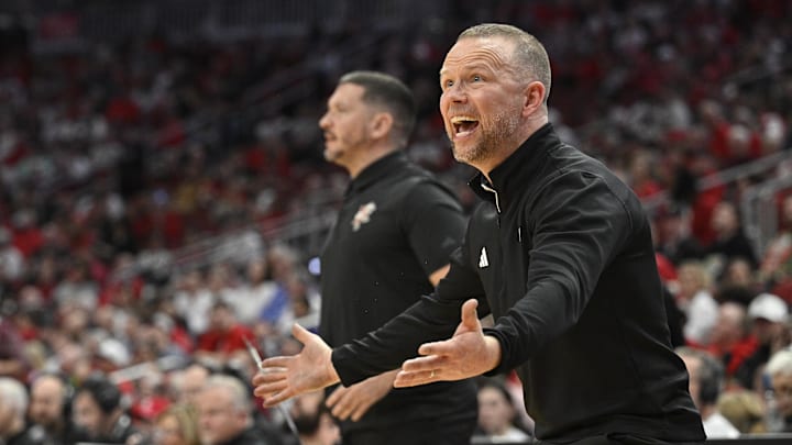 Dec 28, 2024; Louisville, Kentucky, USA;  Louisville Cardinals head coach Pat Kelsey reacts during the second half against the Eastern Kentucky Colonels at KFC Yum! Center. Louisville won 78-76. Mandatory Credit: Jamie Rhodes-Imagn Images