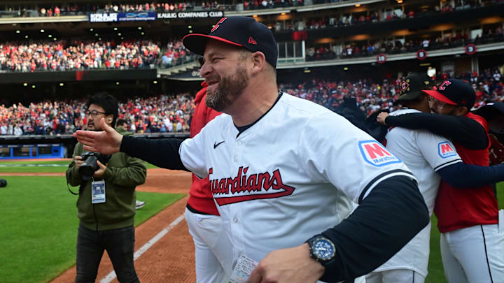 Oct 12, 2024; Cleveland, Ohio, USA; Cleveland Guardians manager Stephen Vogt (12) celebrates defeating the Detroit Tigers during game five of the ALDS for the 2024 MLB Playoffs at Progressive Field. Mandatory Credit: Ken Blaze-Imagn Images