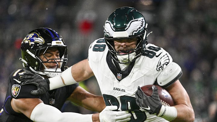 Philadelphia Eagles tight end Dallas Goedert (88) runs through Baltimore Ravens safety Kyle Hamilton (14) tackle attempt. Philadelphia Eagles tight end Dallas Goedert (88) runs through Baltimore Ravens safety Kyle Hamilton (14) tackle attempt.