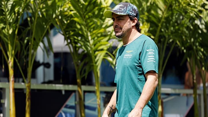 May 5, 2024; Miami Gardens, Florida, USA; Aston Matrin driver Fernando Alonso (14) walks into the F1 May 5, 2024; Miami Gardens, Florida, USA; Aston Matrin driver Fernando Alonso (14) walks into the F1