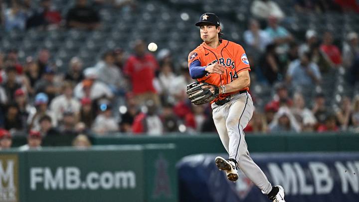 Jun 10, 2026; Anaheim, California, USA; Houston Astros shortstop Shay Whitcomb (14) throws during the ninth inning against the Los Angeles Angels at Angel Stadium. Mandatory Credit: William Liang-Imagn Images