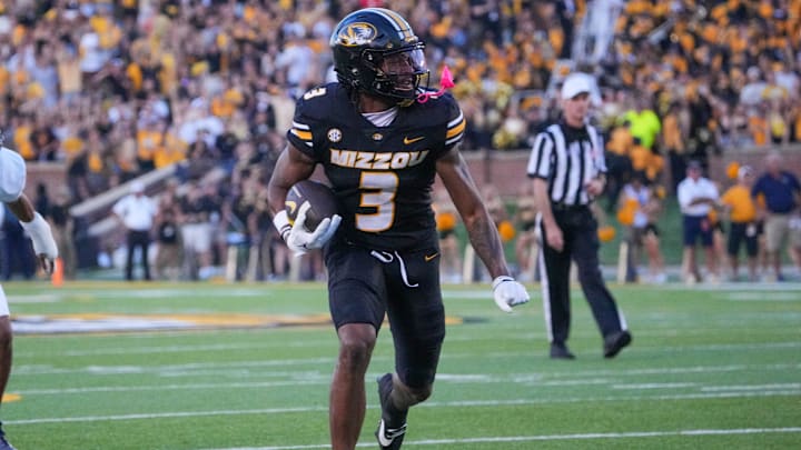 Aug 29, 2024; Columbia, Missouri, USA; Missouri Tigers wide receiver Luther Burden III (3) runs the ball against the Murray State Racers during the game at Faurot Field at Memorial Stadium. Mandatory Credit: Denny Medley-Imagn Images