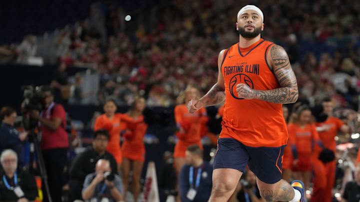 Illinois Fighting Illini guard Kylan Boswell (4) runs up the court during practice ahead of a Final Four game on Friday, April 3, 2026, at Lucas Oil Stadium in Indianapolis.