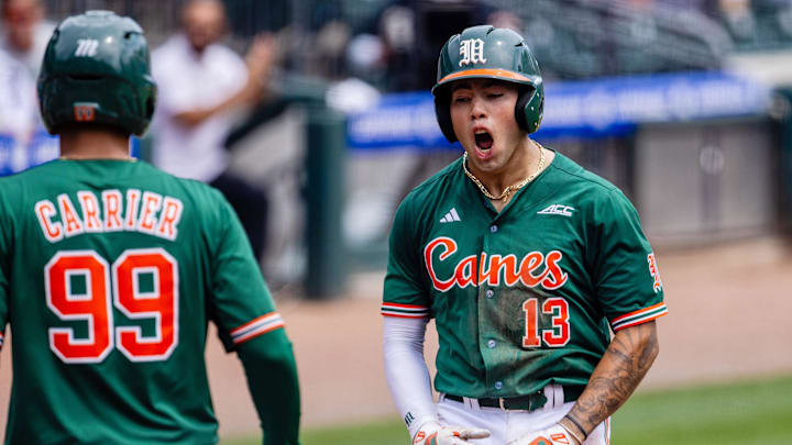 May 23, 2024; Charlotte, NC, USA; Miami (FL) Hurricanes infielder Antonio Jimenez (13) celebrates after a three run homer against the Clemson Tigers in the second inning during the ACC Baseball Tournament at Truist Field. Mandatory Credit: Scott Kinser-USA TODAY Sports