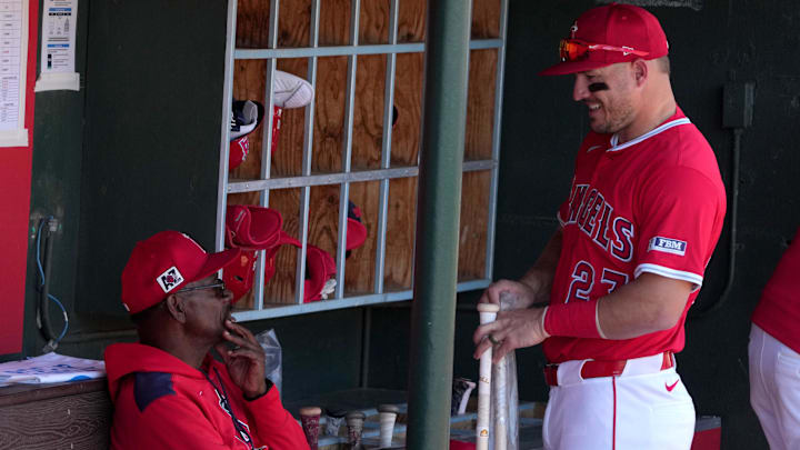 March 9, 2025; Tempe, Arizona, USA; Los Angeles Angels manager Ron Washington (37) and outfielder Mike Trout (27) get ready for a game against the Cincinnati Reds at Tempe Diablo Stadium. Mandatory Credit: Rick Scuteri-Imagn Images