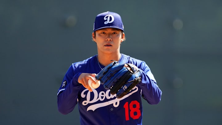 Mar 10, 2025; Phoenix, Arizona, USA; Los Angeles Dodgers pitcher Yoshinobu Yamamoto (18) pitches against the Arizona Diamondbacks during the first inning at Camelback Ranch-Glendale. Mandatory Credit: Joe Camporeale-Imagn Images Mar 10, 2025; Phoenix, Arizona, USA; Los Angeles Dodgers pitcher Yoshinobu Yamamoto (18) pitches against the Arizona Diamondbacks during the first inning at Camelback Ranch-Glendale. Mandatory Credit: Joe Camporeale-Imagn Images