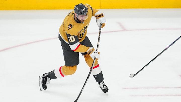 Apr 22, 2025; Las Vegas, Nevada, USA; Vegas Golden Knights center Nicolas Roy (10) shoots against the Minnesota Wild during the third period of game two of the first round of the 2025 Stanley Cup Playoffs at T-Mobile Arena. Mandatory Credit: Stephen R. Sylvanie-Imagn Images
