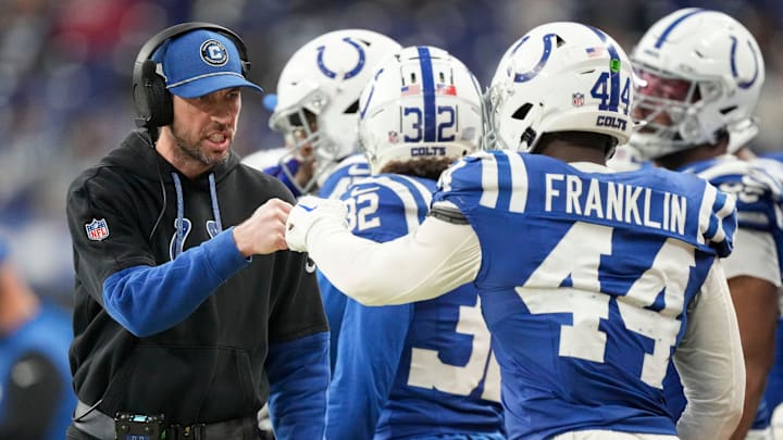 Indianapolis Colts Head Coach Shane Steichen fist bumps Indianapolis Colts linebacker Zaire Franklin (44) on Sunday, Jan. 5, 2025, during a game against the Jacksonville Jaguars at Lucas Oil Stadium in Indianapolis.