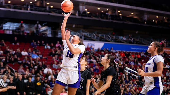 Johnston's Jenica Lewis (10) takes a shot at the basket on Monday, March 3, 2025, at Wells Fargo Arena.