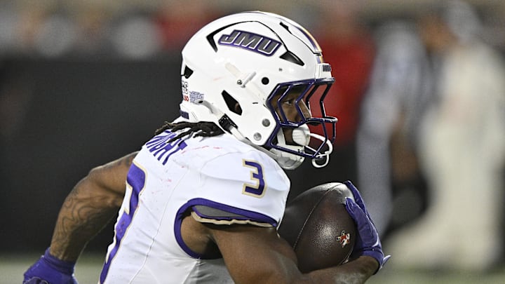 Sep 5, 2025; Louisville, Kentucky, USA;  James Madison Dukes running back Wayne Knight (3) runs the ball against the Louisville Cardinals during the first half at L&N Federal Credit Union Stadium. Mandatory Credit: Jamie Rhodes-Imagn Images