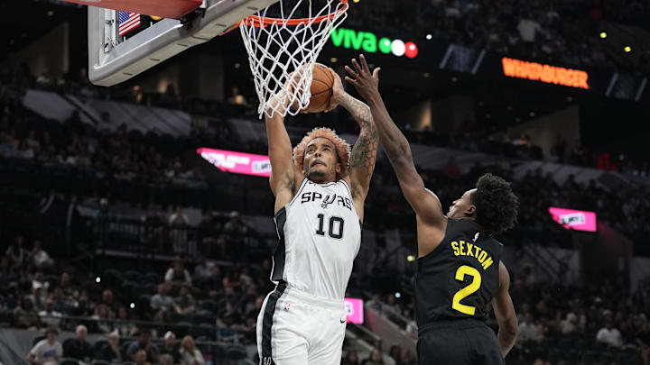 Oct 12, 2024; San Antonio, Texas, USA; San Antonio Spurs forward Jeremy Sochan (10) goes up against Utah Jazz guard Collin Sexton (2) in the second half at Frost Bank Center. Oct 12, 2024; San Antonio, Texas, USA; San Antonio Spurs forward Jeremy Sochan (10) goes up against Utah Jazz guard Collin Sexton (2) in the second half at Frost Bank Center.