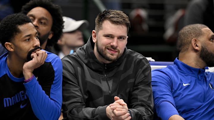 Jan 27, 2025; Dallas, Texas, USA; Dallas Mavericks guard Luka Doncic looks on from the team bench during the second quarter against the Washington Wizards at the American Airlines Center. Mandatory Credit: Jerome Miron-Imagn Images