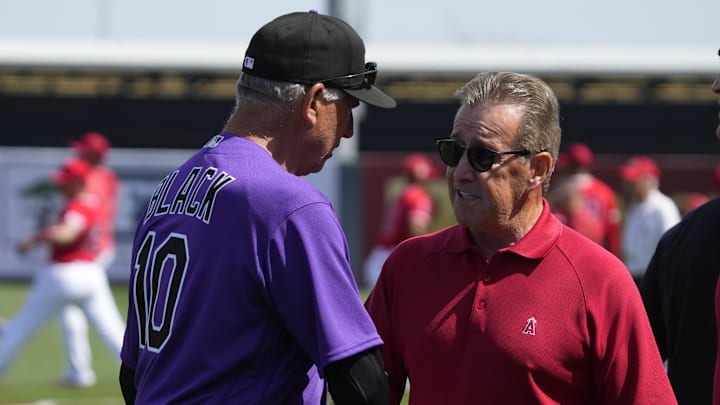 Mar 8, 2023; Tempe, Arizona, USA; Colorado Rockies manager Bud Black (10) talks to Los Angeles Angels owner Arte Moreno before a game at Tempe Diablo Stadium. Mandatory Credit: Rick Scuteri-Imagn Images