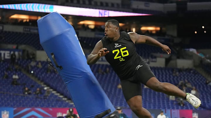 Feb 27, 2025; Indianapolis, IN, USA; Virginia Tech defensive lineman Aeneas Peebles (DL26) participates in drills during the 2025 NFL Combine at Lucas Oil Stadium. Mandatory Credit: Kirby Lee-Imagn Images