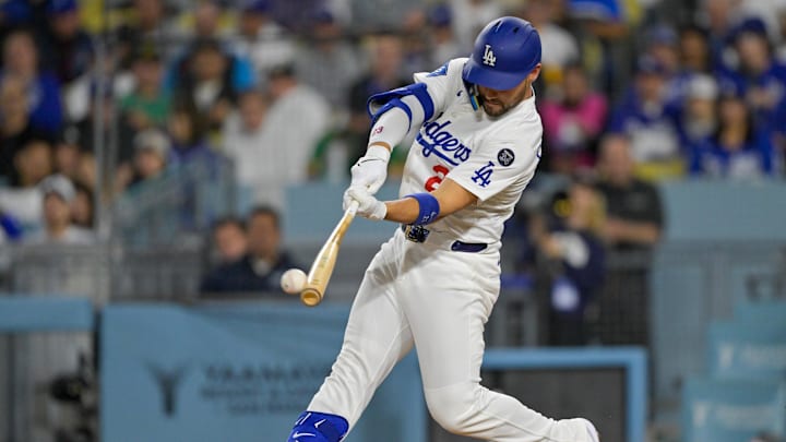 May 15, 2025; Los Angeles, California, USA; Los Angeles Dodgers left fielder Michael Conforto (23) hits a double against the Athletics during the third inning of the game at Dodger Stadium. Mandatory Credit: Jayne Kamin-Oncea-Imagn Images