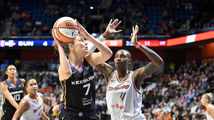 Jun 18, 2025; Uncasville, Connecticut, USA; Connecticut Sun forward Haley Peters (7) shoots over Phoenix Mercury forward Natasha Mack (4) during the first half at Mohegan Sun Arena. Mandatory Credit: Eric Canha-Imagn Images Jun 18, 2025; Uncasville, Connecticut, USA; Connecticut Sun forward Haley Peters (7) shoots over Phoenix Mercury forward Natasha Mack (4) during the first half at Mohegan Sun Arena. Mandatory Credit: Eric Canha-Imagn Images