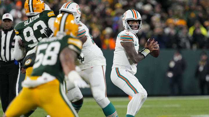Miami Dolphins quarterback Tua Tagovailoa (1) looks to throw a pass during the second quarter against the Green Bay Packers at Lambeau Field in the 2024 season. Miami Dolphins quarterback Tua Tagovailoa (1) looks to throw a pass during the second quarter against the Green Bay Packers at Lambeau Field in the 2024 season.