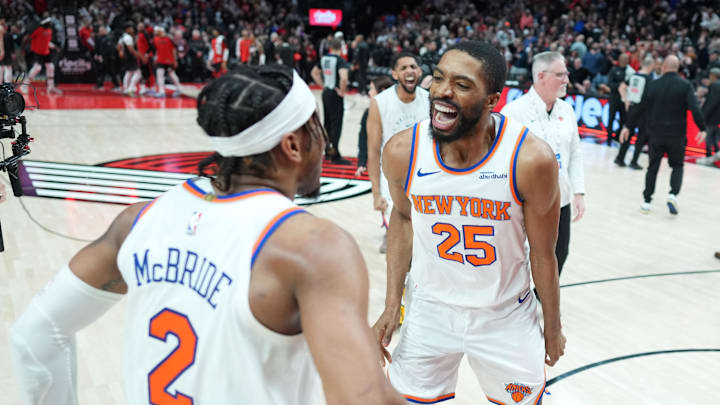 Mar 12, 2025; Portland, Oregon, USA; New York Knicks small forward Mikal Bridges (25) celebrates with point guard Miles McBride (2) after the game against the Portland Trail Blazers at Moda Center. Mandatory Credit: Soobum Im-Imagn Images