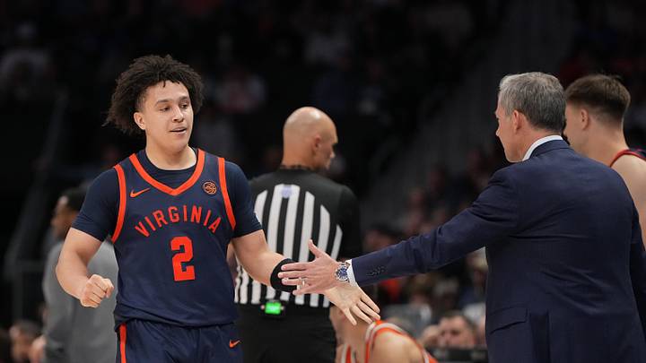 Mar 13, 2026; Charlotte, NC, USA; Virginia Cavaliers guard Chance Mallory (2) with head coach Ryan Odom in the second half at Spectrum Center. Mandatory Credit: Bob Donnan-Imagn Images Mar 13, 2026; Charlotte, NC, USA; Virginia Cavaliers guard Chance Mallory (2) with head coach Ryan Odom in the second half at Spectrum Center. Mandatory Credit: Bob Donnan-Imagn Images