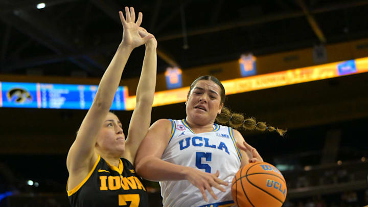 Feb 1, 2026; Los Angeles, California, USA; UCLA Bruins guard Charlisse Leger-Walker (5) is defended by Iowa Hawkeyes guard Addie Deal (7) as she drives to the basket in the first half at Pauley Pavilion presented by Wescom Financial. Mandatory Credit: Jayne Kamin-Oncea-Imagn Images Feb 1, 2026; Los Angeles, California, USA; UCLA Bruins guard Charlisse Leger-Walker (5) is defended by Iowa Hawkeyes guard Addie Deal (7) as she drives to the basket in the first half at Pauley Pavilion presented by Wescom Financial. Mandatory Credit: Jayne Kamin-Oncea-Imagn Images