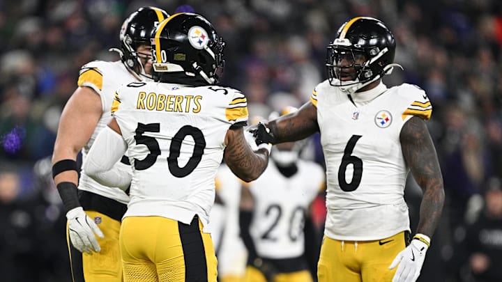 Jan 11, 2025; Baltimore, Maryland, USA; Pittsburgh Steelers linebacker Elandon Roberts (50) and linebacker Patrick Queen (6) react after a tackle in the second quarter against the Baltimore Ravens in an AFC wild card game at M&T Bank Stadium. Mandatory Credit: Tommy Gilligan-Imagn Images