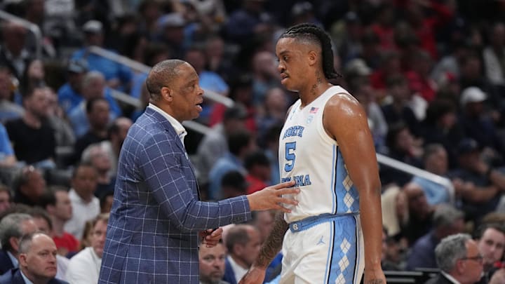 Mar 28, 2024; Los Angeles, CA, USA; North Carolina Tar Heels head coach Hubert Davis talks with forward Armando Bacot (5) in the first half against the Alabama Crimson Tide in the semifinals of the West Regional of the 2024 NCAA Tournament at Crypto.com Arena. Mandatory Credit: Kirby Lee-USA TODAY Sports