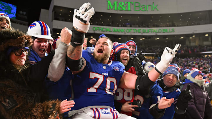Jan 4, 2026; Orchard Park, New York, USA; Buffalo Bills offensive tackle Alec Anderson (70) jumps into the stands after the game against the New York Jets at Highmark Stadium