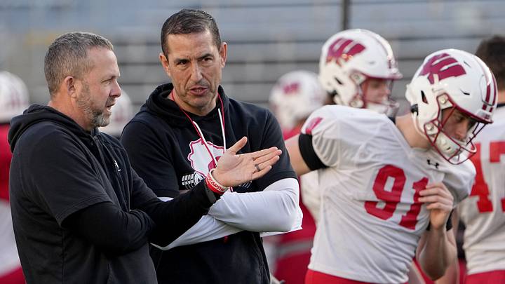 Wisconsin defensive coordinator Mike Tressel, left, talks with head coach Luke Fickell during practice Tuesday, April 11, 2023 at Camp Randall Stadium in Madison, Wis.