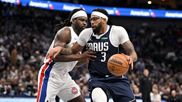 Dec 18, 2025; Dallas, Texas, USA; Dallas Mavericks forward Anthony Davis (3) drives to the basket against Detroit Pistons forward Isaiah Stewart (28) during the second quarter at the American Airlines Center. Mandatory Credit: Jerome Miron-Imagn Images
