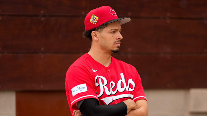 Cincinnati Reds pitcher Chase Burns (26) watches Hunter Greene throw a bullpen session