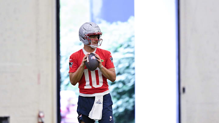 Jun 10, 2025; Foxborough, MA, USA; New England Patriots quarterback Drake Maye (10) warms up during minicamp held in the WIN Field House at Gillette Stadium. Mandatory Credit: Eric Canha-Imagn Images