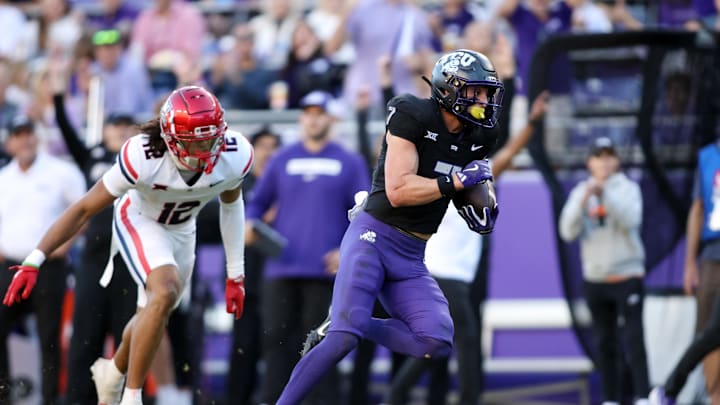 Nov 23, 2024; Fort Worth, Texas, USA; TCU Horned Frogs wide receiver JP Richardson (7) runs for touchdown against the Arizona Wildcats in the second half at Amon G. Carter Stadium. Mandatory Credit: Tim Heitman-Imagn Images