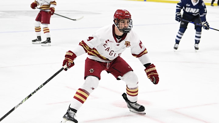 Feb 28, 2025; Chestnut Hill, MA, USA; Boston College forward Andre Gasseau (24) skates against the University of New Hampshire Wildcats during the first period at Conte Forum. Mandatory Credit: Eric Canha-Imagn Images