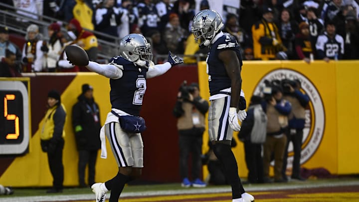 Dallas Cowboys cornerback Jourdan Lewis celebrates after receiving a fumble with safety Jayron Kearse