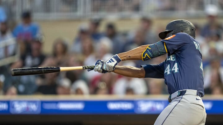 Seattle Mariners center fielder Julio Rodriguez (44) hits a two run double against the Minnesota Twins in the ninth inning at Target Field on June 23. Seattle Mariners center fielder Julio Rodriguez (44) hits a two run double against the Minnesota Twins in the ninth inning at Target Field on June 23.
