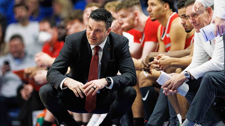 Dec 29, 2023; Lexington, Kentucky, USA; Illinois State Redbirds head coach Ryan Pedon talks to his players and assistant coaches on the bench during the second half against the Kentucky Wildcats at Rupp Arena at Central Bank Center. Mandatory Credit: Jordan Prather-Imagn Images