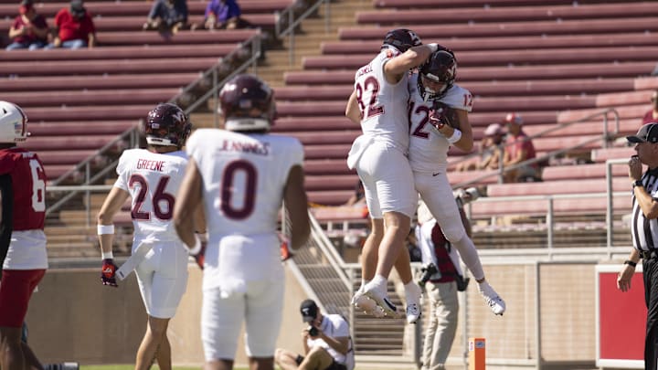 Oct 5, 2024; Stanford, California, USA;  Virginia Tech Hokies tight end Benji Gosnell (82) and wide receiver Stephen Gosnell (12) celebrate after scoring a touchdown against the Stanford Cardinal during the first quarter at Stanford Stadium. Mandatory Credit: Stan Szeto-Imagn Images
