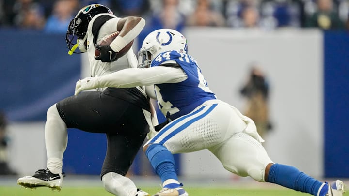 Jacksonville Jaguars running back Travis Etienne Jr. (1) evades tackle by Indianapolis Colts linebacker Zaire Franklin (44) on Sunday, Jan. 5, 2025, during a game against the Jacksonville Jaguars at Lucas Oil Stadium in Indianapolis. Jacksonville Jaguars running back Travis Etienne Jr. (1) evades tackle by Indianapolis Colts linebacker Zaire Franklin (44) on Sunday, Jan. 5, 2025, during a game against the Jacksonville Jaguars at Lucas Oil Stadium in Indianapolis.
