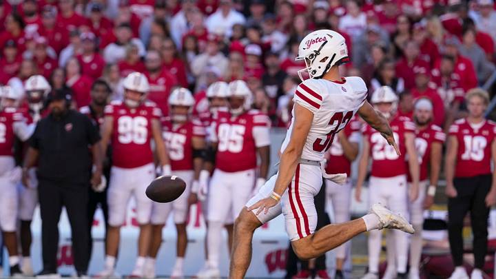 Sep 7, 2024; Madison, Wisconsin, USA; South Dakota Coyotes punter Tyler Ebel (32) during the game against the Wisconsin Badgers at Camp Randall Stadium. Mandatory Credit: Jeff Hanisch-Imagn Images Sep 7, 2024; Madison, Wisconsin, USA; South Dakota Coyotes punter Tyler Ebel (32) during the game against the Wisconsin Badgers at Camp Randall Stadium. Mandatory Credit: Jeff Hanisch-Imagn Images