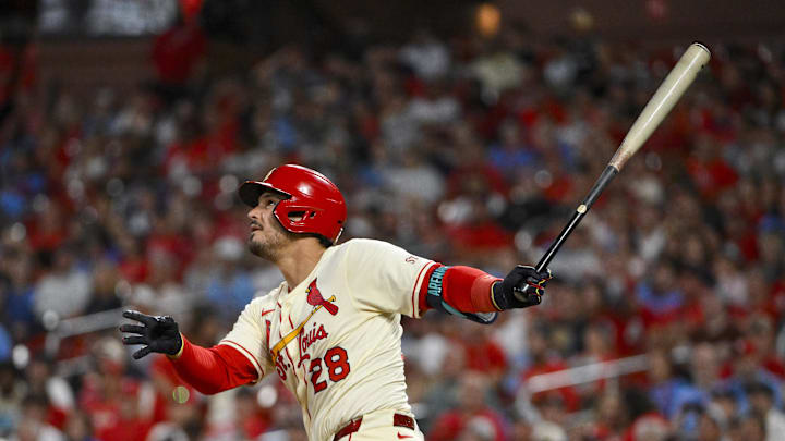 Sep 20, 2025; St. Louis, Missouri, USA; St. Louis Cardinals third baseman Nolan Arenado (28) hits a one run single against the Milwaukee Brewers during the fourth inning at Busch Stadium. Mandatory Credit: Jeff Curry-Imagn Images