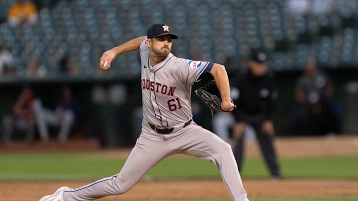 Jul 23, 2024; Oakland, California, USA;  Houston Astros pitcher Seth Martinez (61) pitches during the sixth inning against the Oakland Athletics at Oakland-Alameda County Coliseum. 