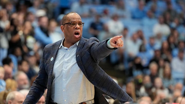 Mar 1, 2025; Chapel Hill, North Carolina, USA;  North Carolina Tar Heels head coach Hubert Davis reacts in the first half at Dean E. Smith Center. Mandatory Credit: Bob Donnan-Imagn Images