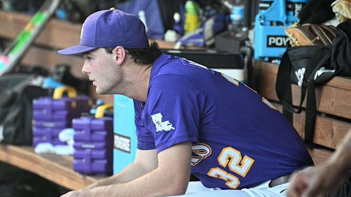 LSU Tigers starting pitcher Kade Anderson (32) sits in the dugout between the eighth and ninth innings against the Coastal Carolina Chanticleers at Charles Schwab Field on June 21. 