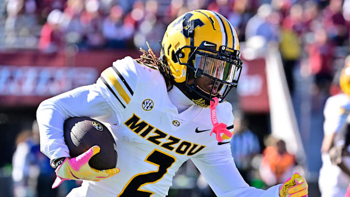 Oct 12, 2024; Amherst, Massachusetts, USA; Missouri Tigers wide receiver Marquis Johnson (2) runs the ball against the Massachusetts Minutemen during the second half at Warren McGuirk Alumni Stadium. Mandatory Credit: Eric Canha-Imagn Images